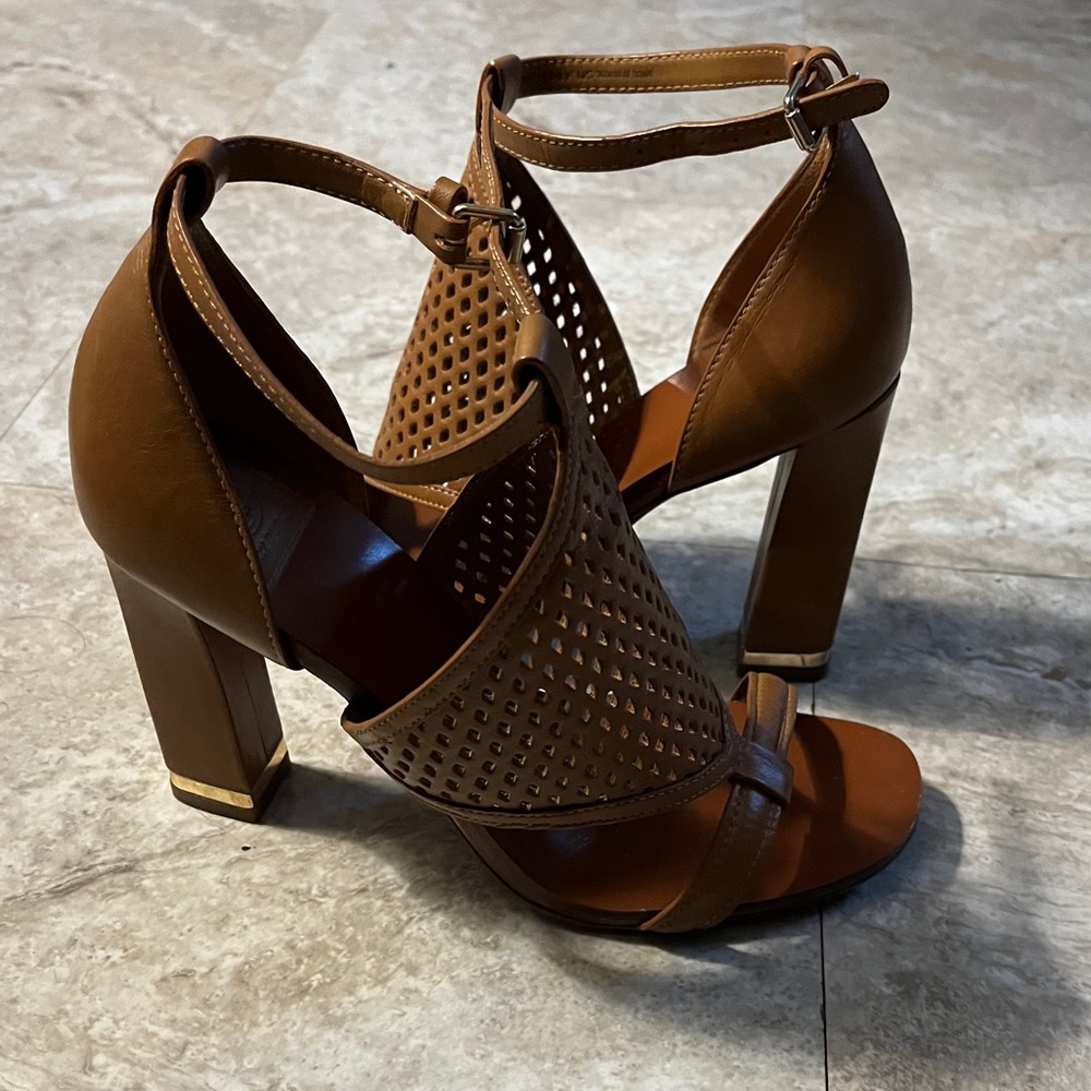 Tory Burch Brown Leather Heels, with buckle ankle strap.